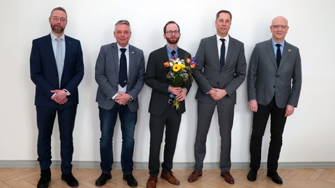 Gruppenfoto vom Promovent Müller-Pabel und dem Prüfungsausschuss