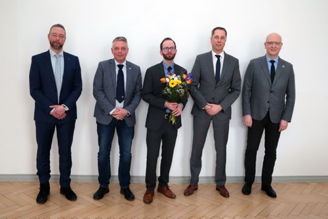 Gruppenfoto vom Promovent Müller-Pabel und dem Prüfungsausschuss