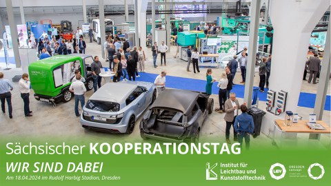 Hall with cars, machines and exhibitors