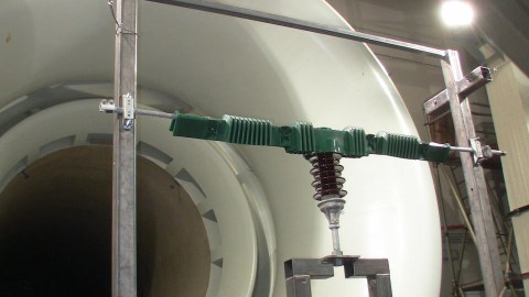 Wind tunnel test on protective covers for insulators on high-voltage power lines used to prevent short circuits caused by birds