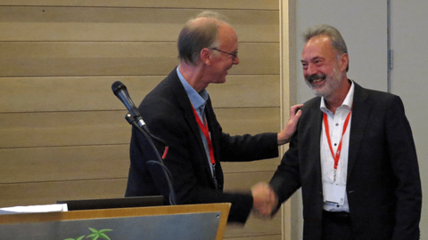 Andrew Plummer, Mechatronics, Informatics and Control Group Past Chair, awards Jürgen Weber, the 2022 Joseph Bramah Medal