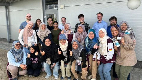 Gruppenfoto einer Besuchergruppe aus Malaysia.