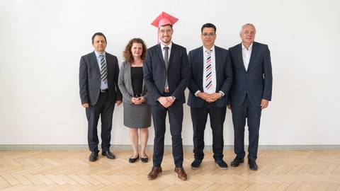 Mr. Dr.-Ing. Dominik Nuss with the members of the examination board