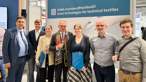 M.Sc. Katharina Maria Ernst and Lena Fink honored as young scientists by Mr. Peter D. Dornier (center)