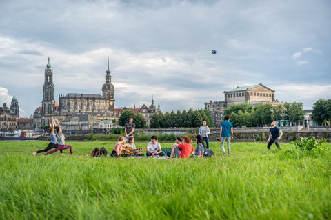 Picnic in front of Dresden’s Old Town skyline.