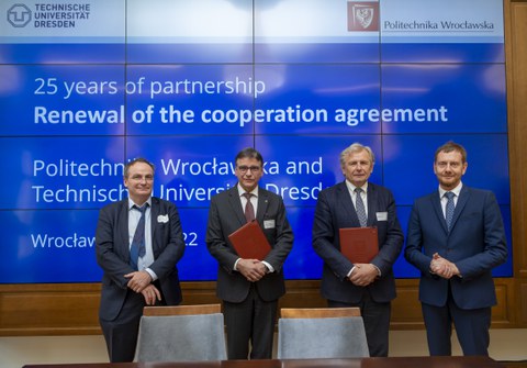 group picture of 4 male speakers of the conference