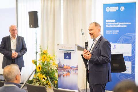 Speaker at a conference.