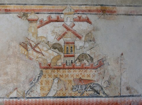 Das Bild zeigt eine Wandmalerei aus dem Mittelalter. An einigen Stellen ist die Farbe bereits abgeplatzt.