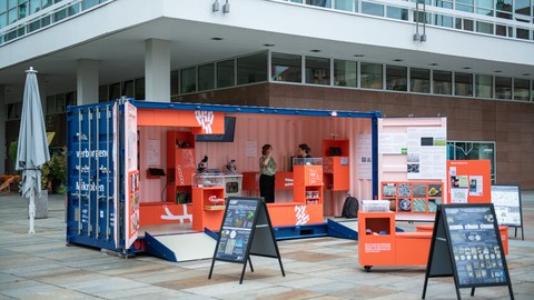 Travelling exhibition Bakteriopolis in front of the Kulturpalast in Dresden