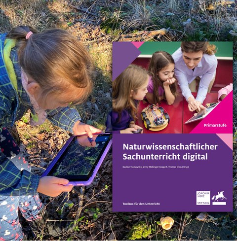 Kind mit Tablet im Wald