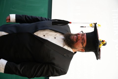 Man with PhD hat