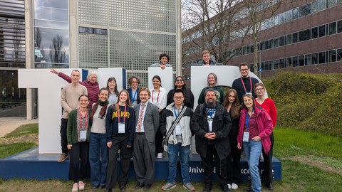 a group of people posing for the camera