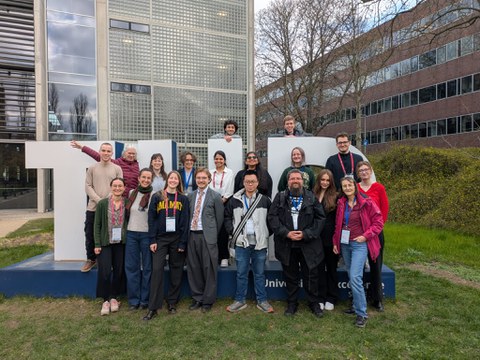 a group of people posing for the camera