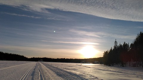 Schneelandschaft bei Sonnenuntergang