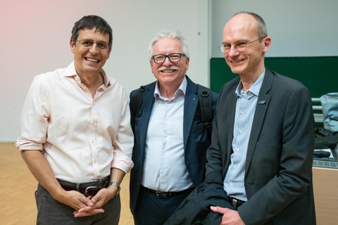 Physik Nobelpreisträger Didier Queloz mit Prof. Dr. Carsten Timm und Günther Hasinger