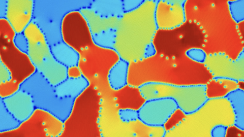 Darstellung einer Phasenfeld-Kristallsimulation, die die Mikrostrukturentwicklung eines Polykristalls in zwei Dimensionen wiedergibt. 