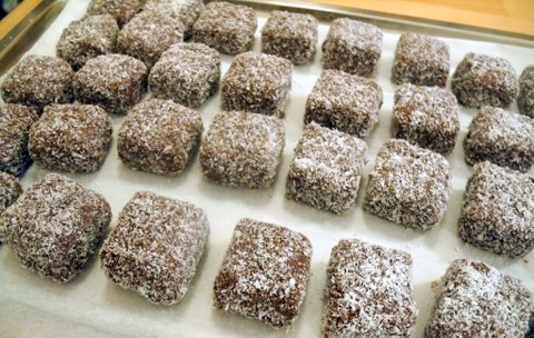 cake cubes with chocolate and coconut coating