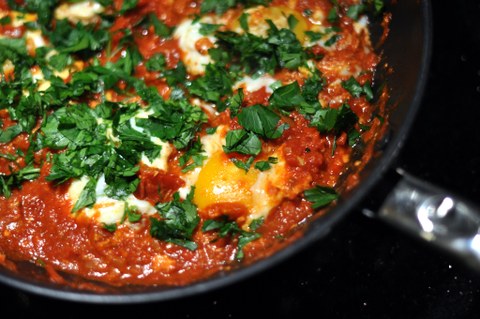 Eggs cooked in tomato sauce