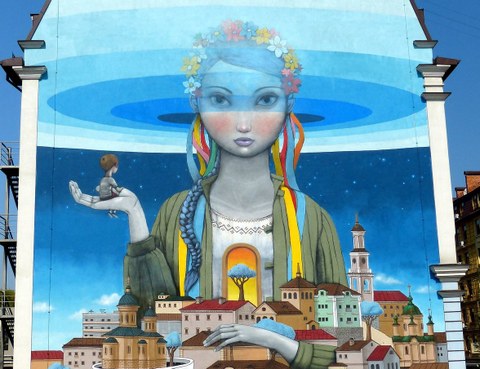 Kyiv mural of a girl in Ukrainian traditional dress