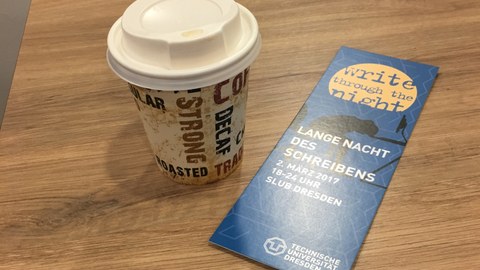 Bookmark from the Long Night of Writing 2017 with a Coffee-To-Go Cup