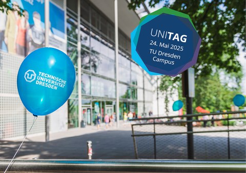 Blick auf das HSZ mit blauem Ballon und TUD-Logo