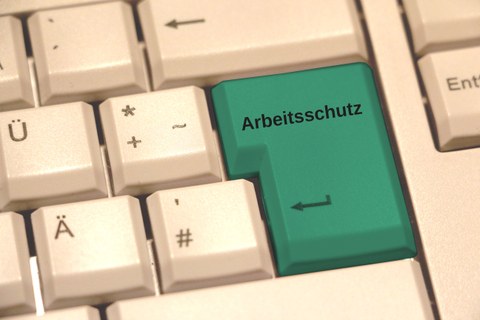 Keyboard with the inscription „Arbeitsschutz“ on the ENTER key