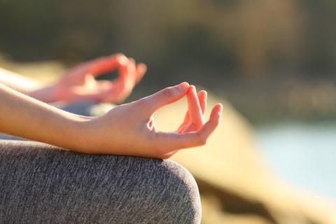 Photo of hands in meditation posture