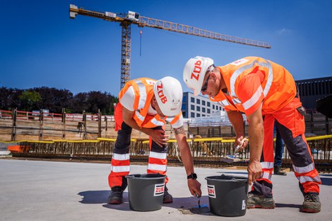 Construction workers at the ceremony.