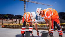 Construction workers at the ceremony.
