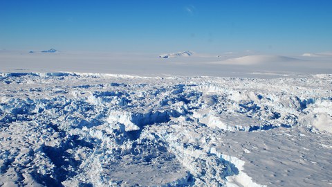 Shear zone of the Pine Island Glacier (West Antarctica). In the area visible in the foreground, the glacier has already become floating and is being broken up into icebergs by the shear forces.