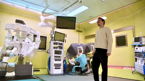 Person in an immersive operating room installation on the holodeck 