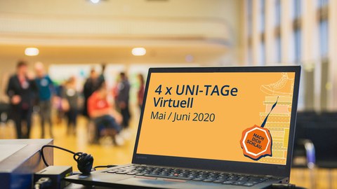 Ein geöffneter Laptop mit der Ankündigung für den Unitag 2020 steht im linken Vordergrund, im Hintergrund Studenten