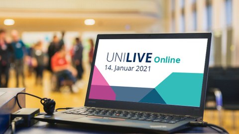 Ein aufgeklappter Laptop, auf dem Display ist das Logo von UNI Live zu sehen.