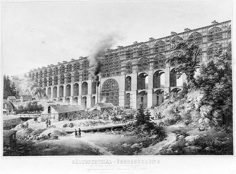 Die Lithografie von Friedrich Wilhelm Baessler zeigt die Göltzschtalbrücke, für die Schubert die Konstruktionsunterlagen erstellte. Die größte Steinbogenbrücke der Welt wurde von 1846 bis 1851 aus 26 Millionen Ziegeln erbaut.