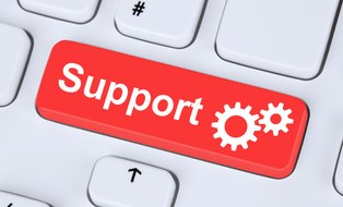 Foto einer Tastatur, auf der eine große rote Taste mit der Aufschrift "Support" zu sehen ist.