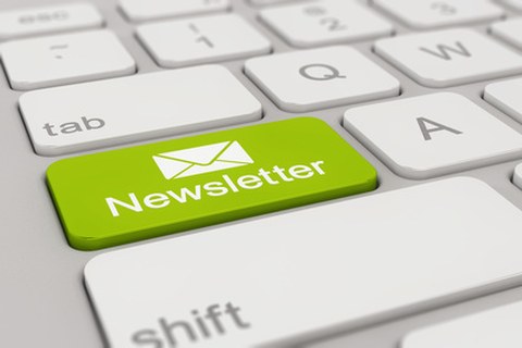 Tastatur mit grüner Newsletter-Taste