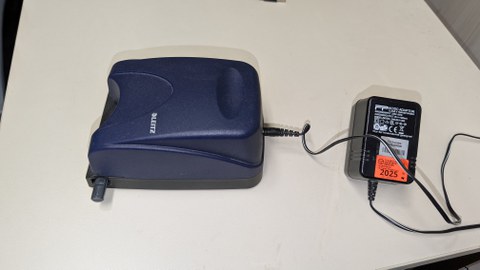 Photo shows the electric hole punch on a table