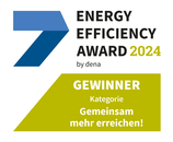 Label mit der Beschriftung: Energy Efficiency Award 2024 by dena – Gewinner Kategorie "Gemeinsam mehr erreichen!"