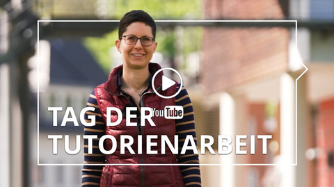 Person smiling outdoors, with buildings and trees in the background. Overlaid text: "Tag der Tutorienarbeit" with YouTube symbol and play button.