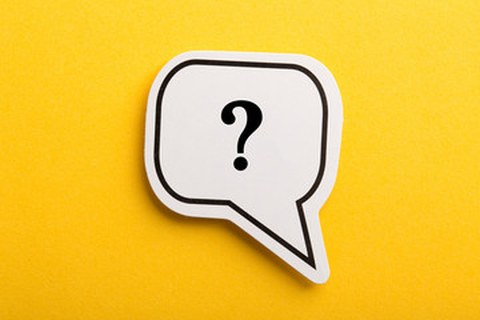 A question mark on a yellow background.