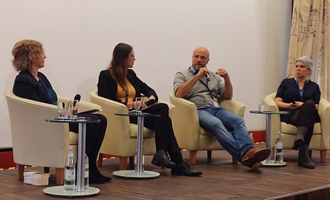 Professor Anna Holzscheiter engaged in discussion with Professor Lena Partzsch, Professor Manuel Fischer, and Larika Waldmann.