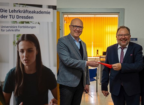 Zwei Männer stehen vor einer geöffneten Tür und halten ein Stück rotes Band in der Hand